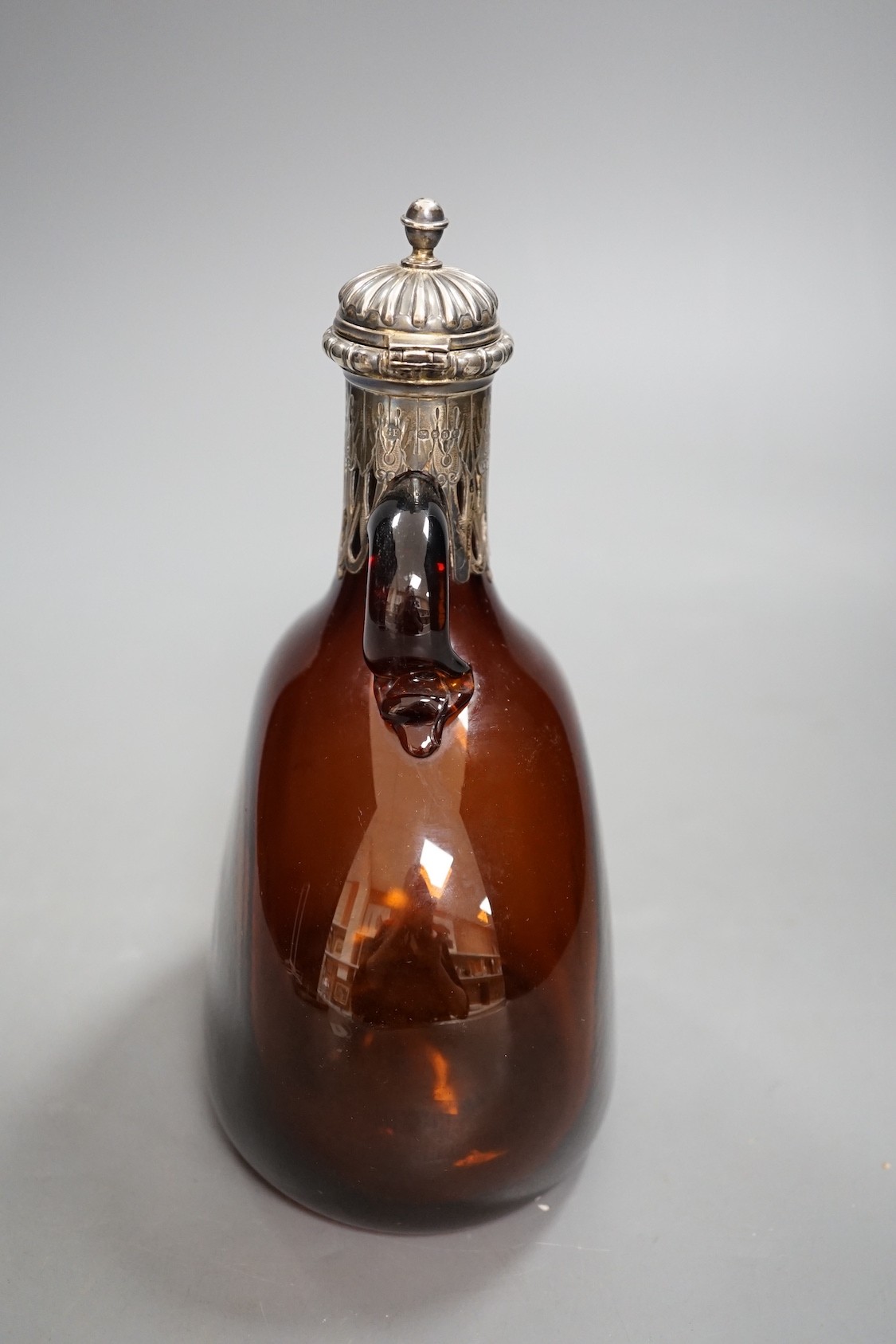 A Victorian silver mounted amber glass hock jug, by George Fox, London 1869, 20cm tall